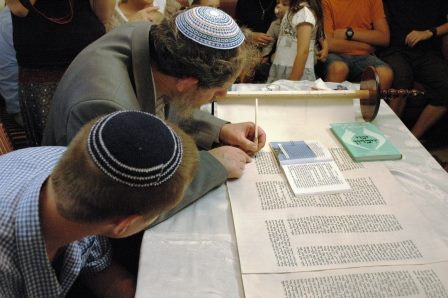 The Sofer writes the last words of the new Tora scroll
